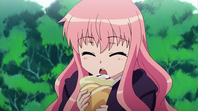 Louise munches on crepe